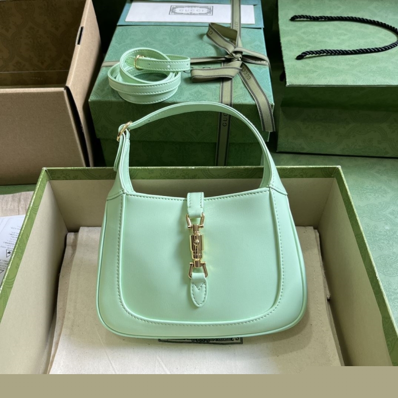 G*u*i top handle bags